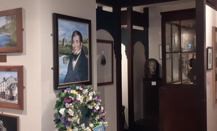 Interior with a Brian Jones painting of Robert Owen.